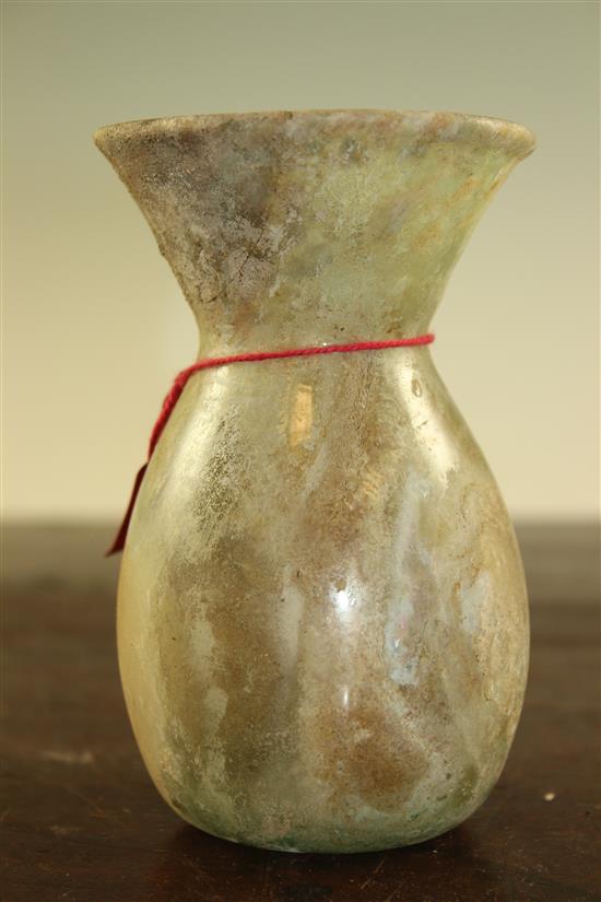An Islamic glass vase, c.9th century A.D., 13cm, repair